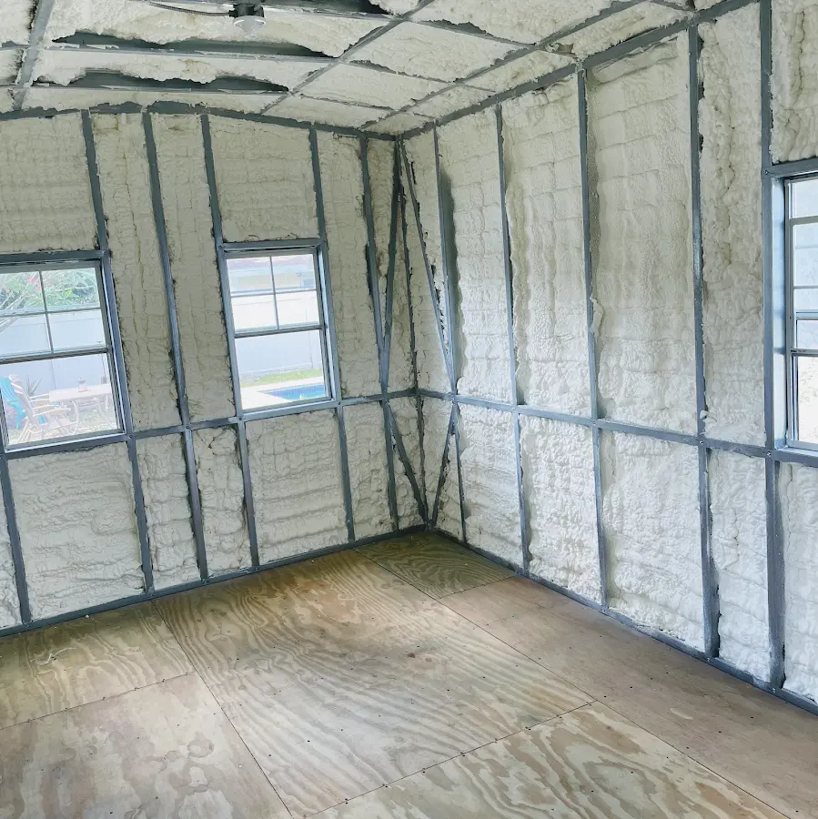 Closed-cell spray foam insulation applied to wall cavities in a residential project in Verdigris